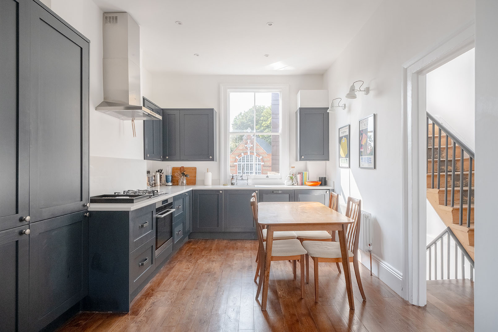 A modern dark grey kitchen for property photography taken for the sale of the property.